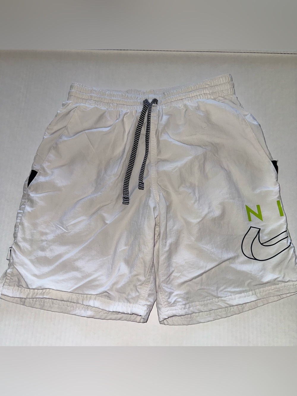 Nike White Athletic Shorts with Neon Accent